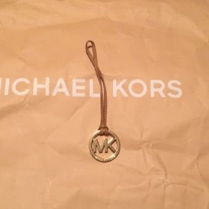 Michael Kors Tan Hangtag with Gold-Tone Medallion